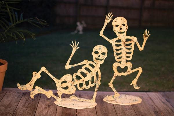 Set Of Two Glow In The Dark Skeletons On Bases