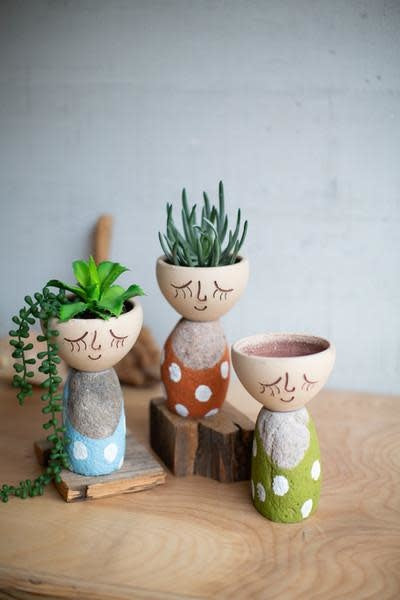 Set Of Three Clay Face Planters With River Rock Pace