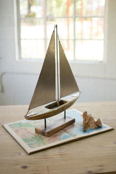 Wood And Iron Sailboat On A Stand